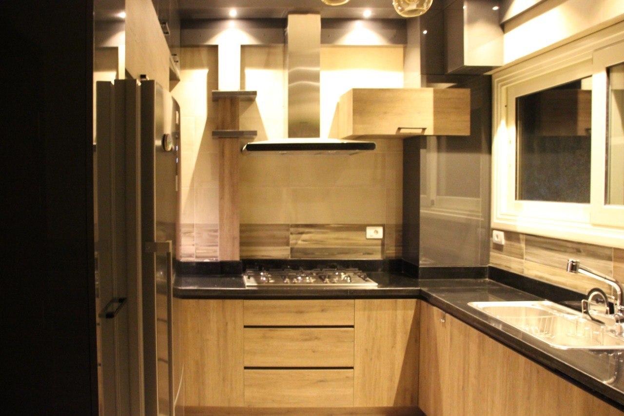 Modern kitchen with dark countertop